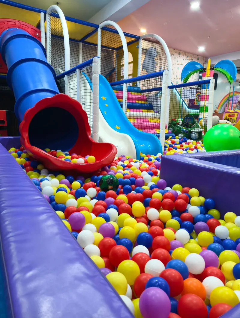 Slides and a ball pool in the indoor soft-play arena